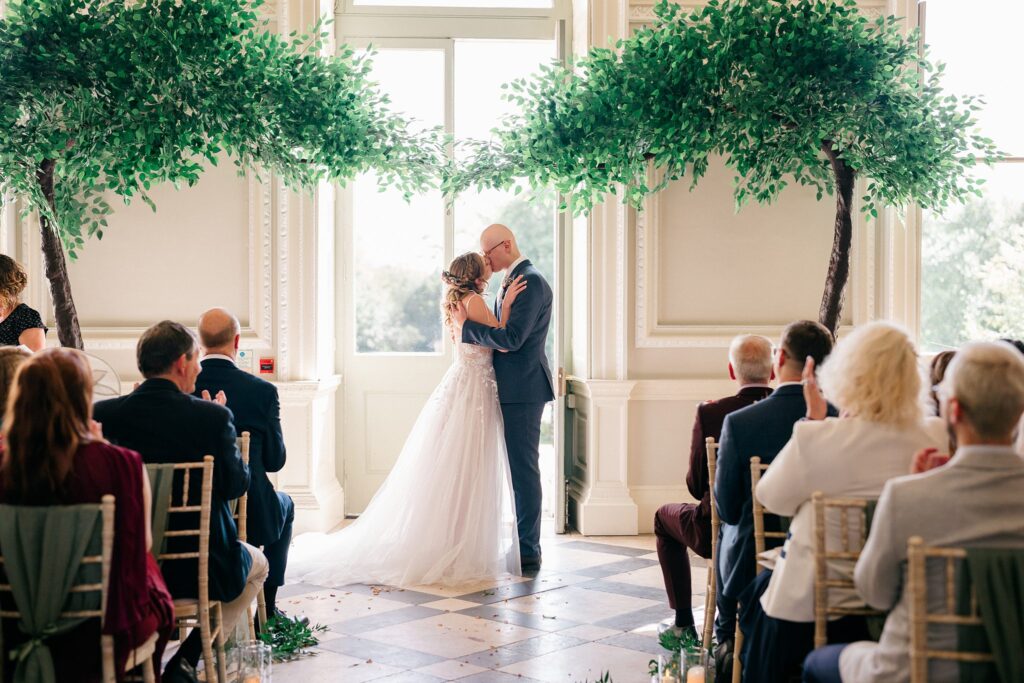 Bride and groom share first kiss at Crowcombe Court wedding ceremony