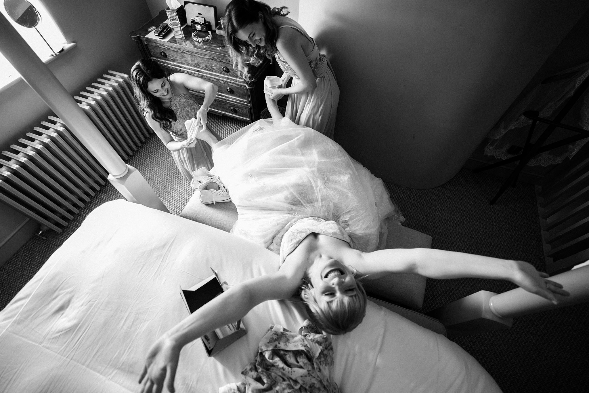 White bridal Converse trainers as wedding shoes for Gloucestershire weddings and outdoor photos